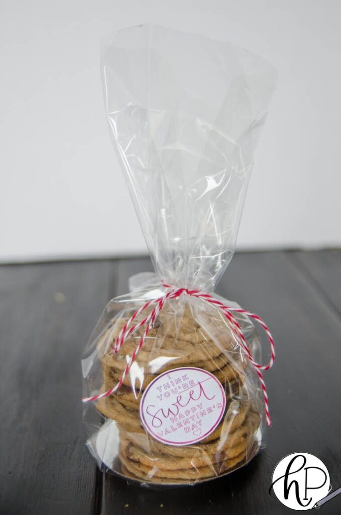 cookies packaged in clear cello bag with printable valentines label on front which reads 'for one sweet valentine'