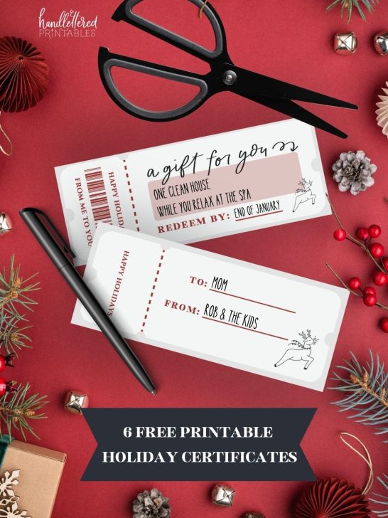 free printable holiday certificates- image of red christmas certificate cut out with text written, styled with scissors, pen and holiday ornaments. text over reads 6 free printable holiday certificates