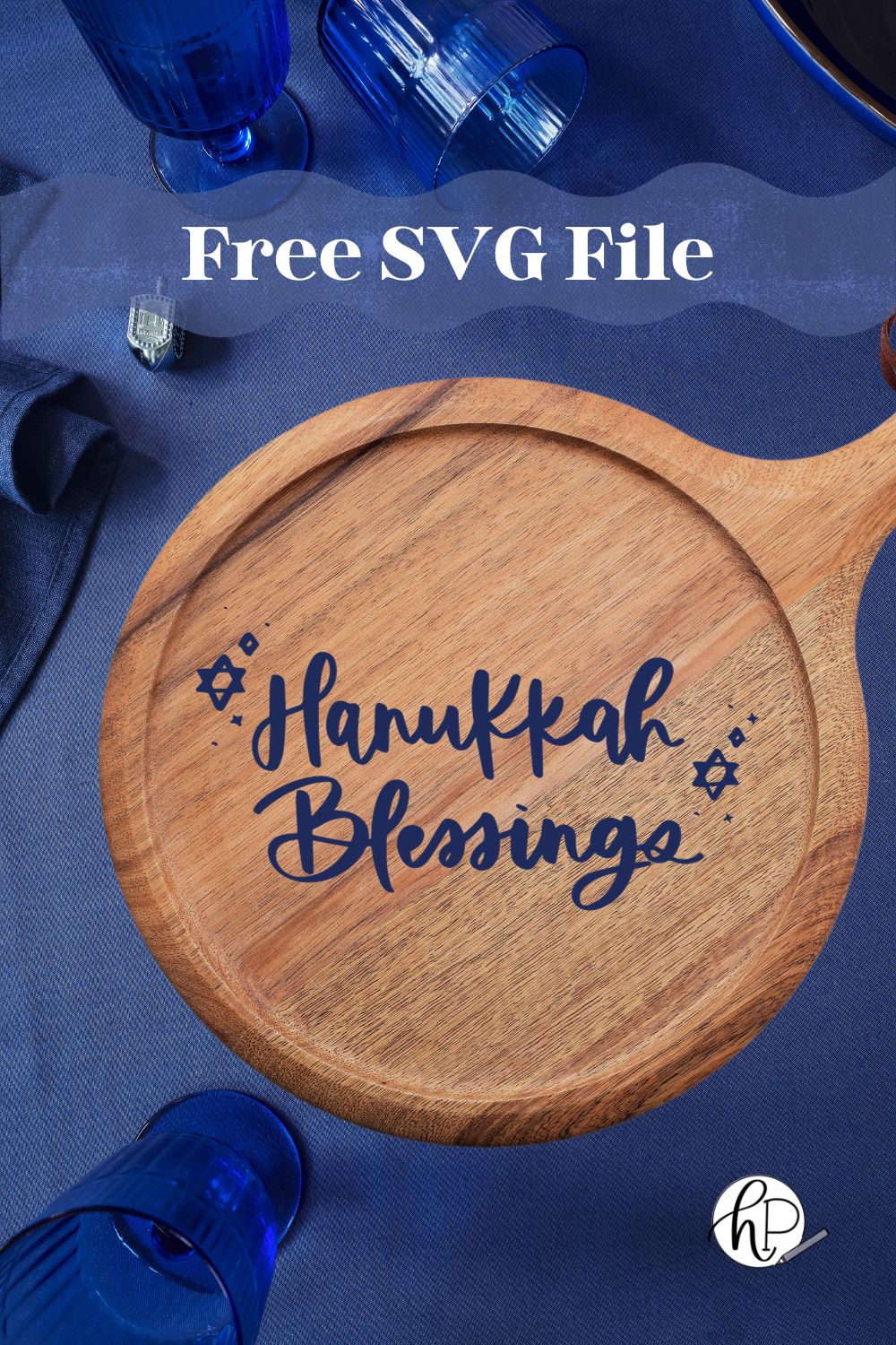 Hanukkah Blessings free SVG file for holiday crafting - shown on a wooden serving board