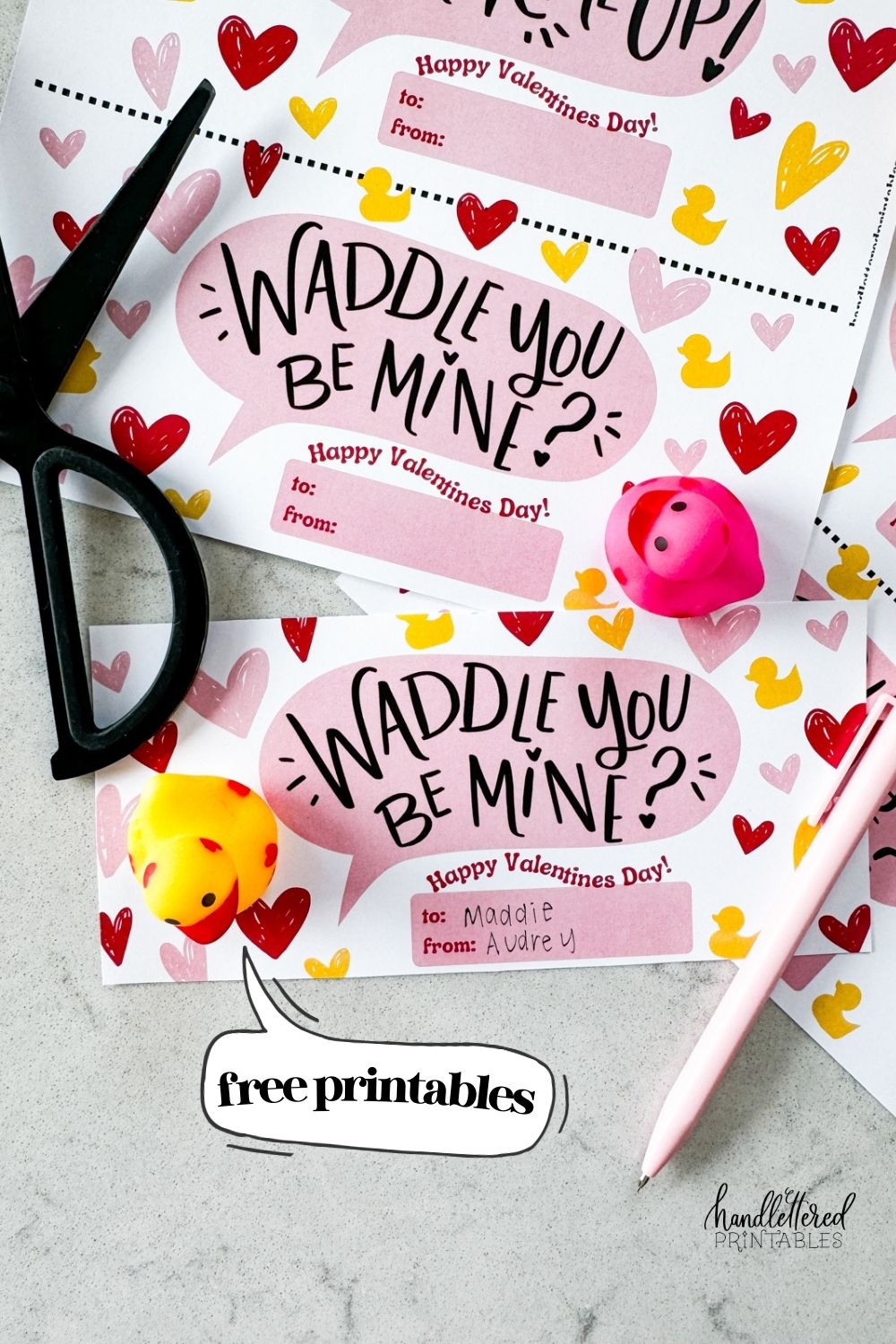 duck themed printable valentines day cards. card shown reads: waddle you be mine with a small happy valentines day. shown with rubber duckies