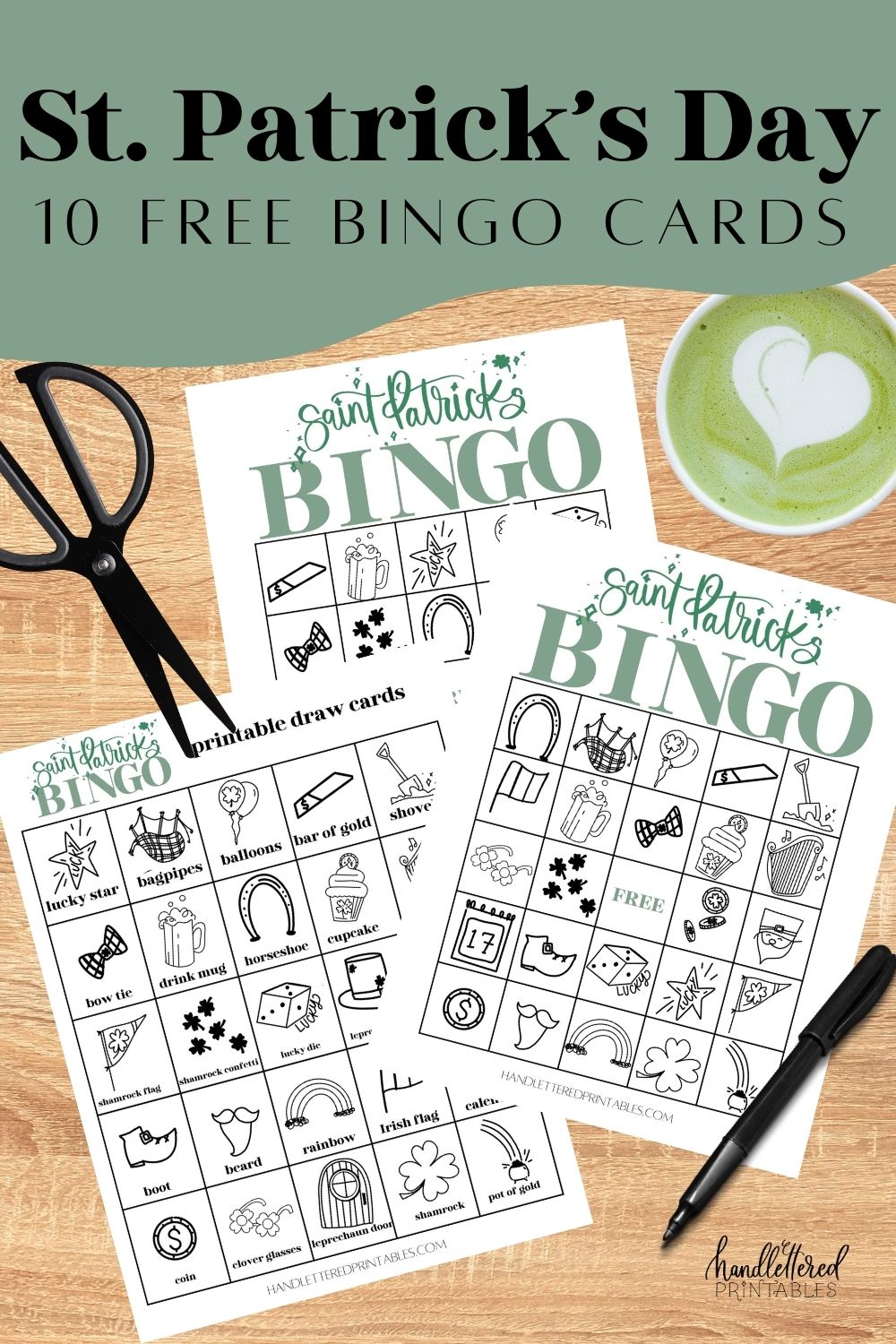 image of two printed saint patrick's day bingo cards with 1 printed saint patricks day bingo calling cards ready to be cut out on wooden table styled with black scissors and black pen beside a green hot beverage text over reads: st patrick's day 10 free bingo cards