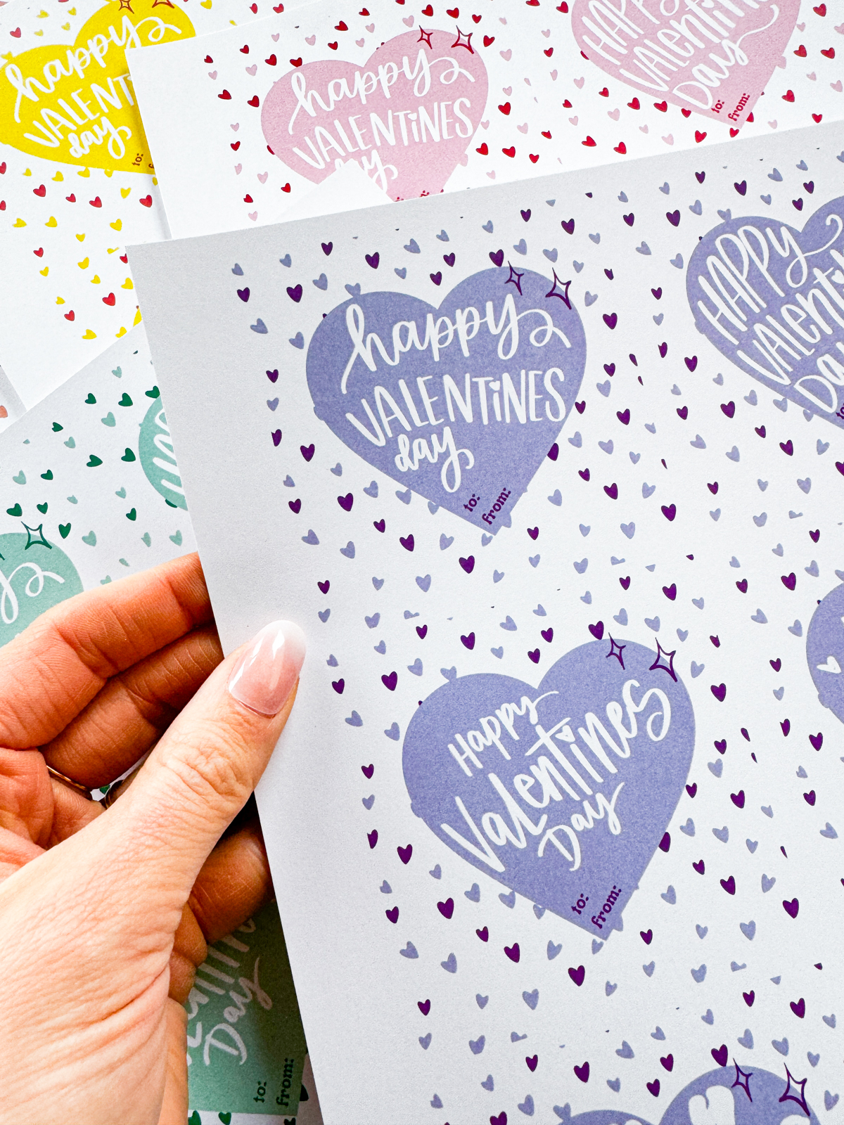 happy valentines day hand lettered valentines cards free printable shown printed off but not yet cut to size. 6 color schemes available, purple is focus of image